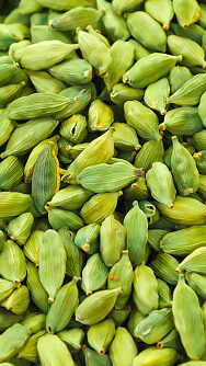 pods of green cardamom in a pile